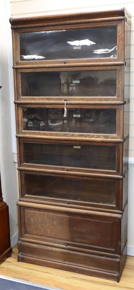 A Globe Wernicke six-section glazed oak bookcase W.86cm